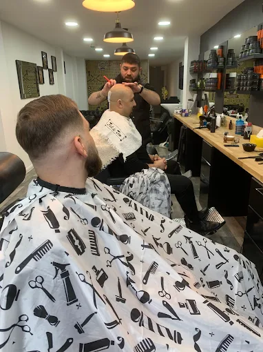 Skin fade in progress at Fade & Trim Barbers