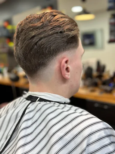 Back view of a fresh skin fade with neat finish